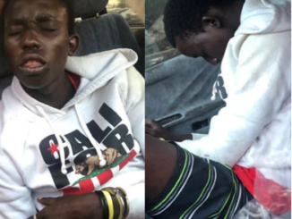 Here are the Photos of a thief who falls asleep during operation in the compound of the house owner