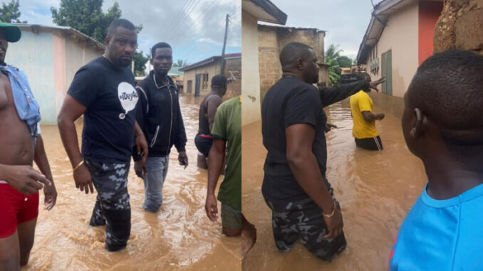 John Dumelo Spotted Swimming In Flood To Sympathize With Victims At Ayawaso – WATCH VIDEO