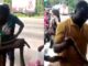 See How Two Sakawa Boys Fight Kasoa Market Women for Killing Snake that Crawled Out of Their Car To Vomit Money -[WATCH VIDEO]